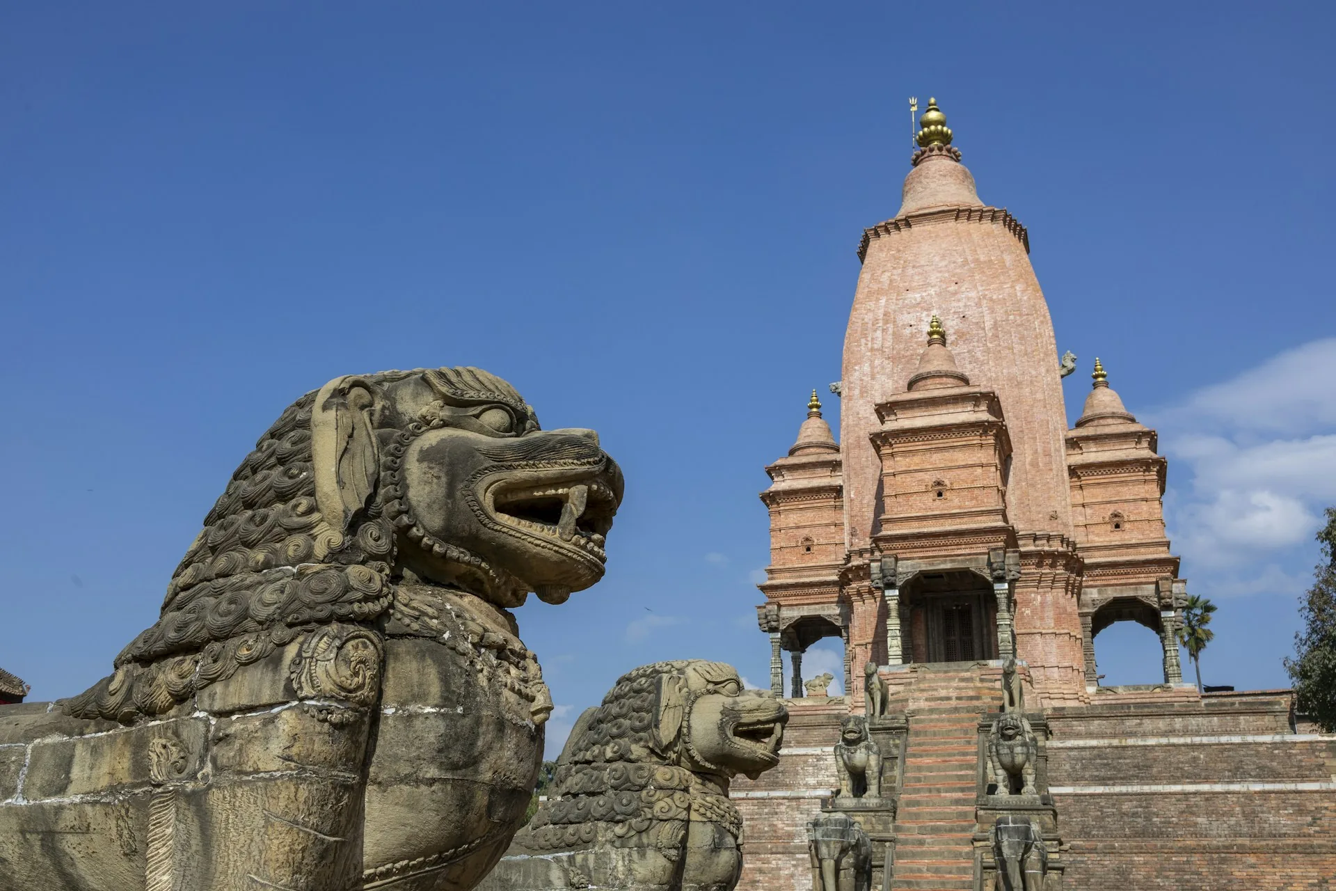 Stone guardian at Bhaktapur Durbar Square — Kathmandu Valley heritage