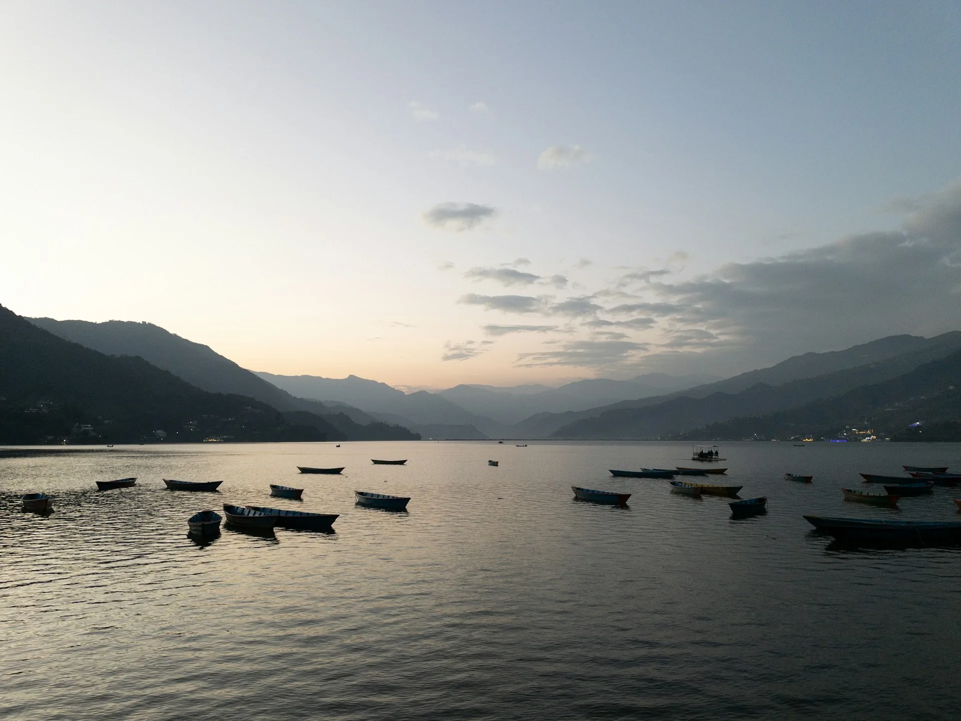 Morning calm on Phewa Lake with Annapurna behind